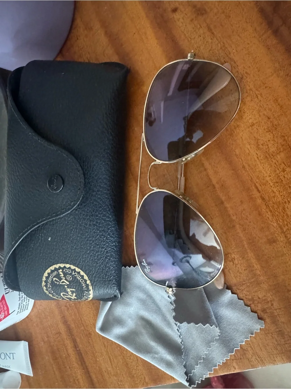 Ray-Ban Women’s Gold Aviator Sunglasses with Purple Lenses